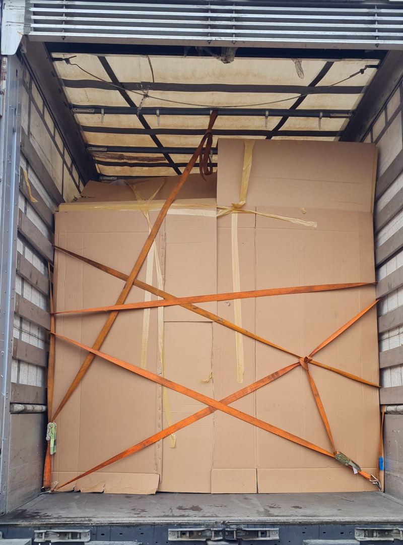 Large load strapped securely inside a removals lorry